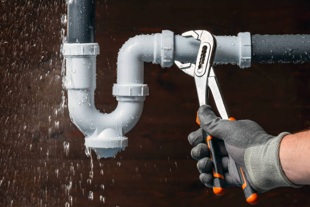 Professional Emergency Plumber technician working in Savoy, IL